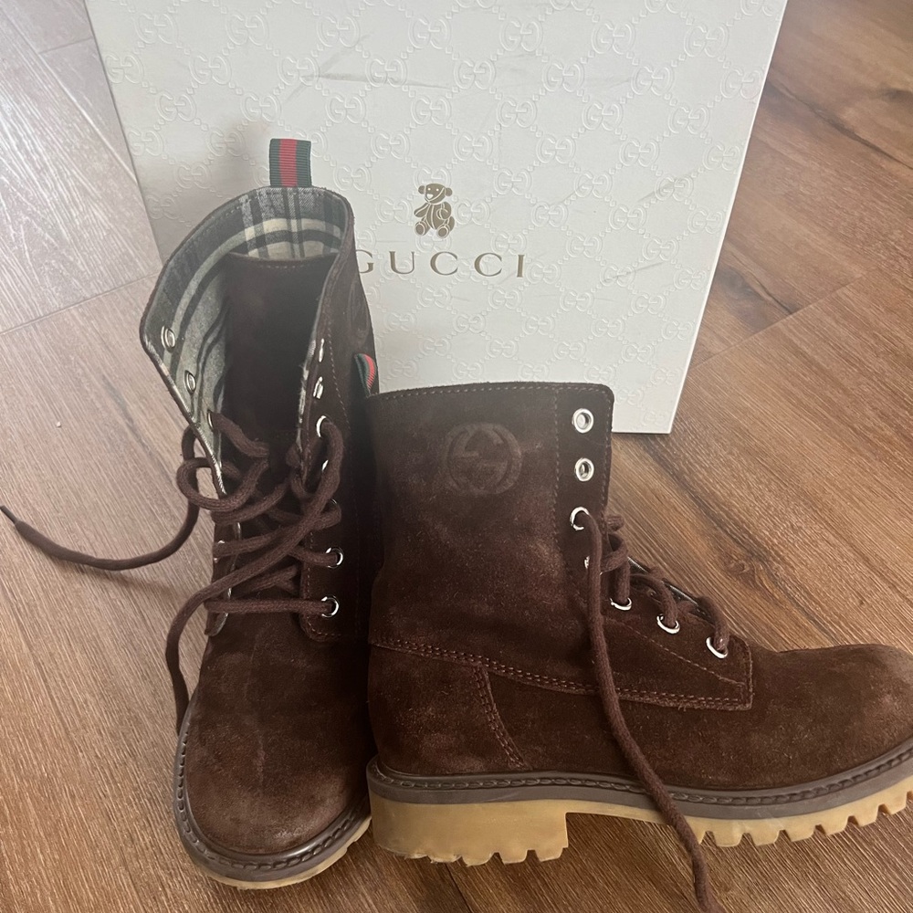 Boys Distressed Gucci boots.